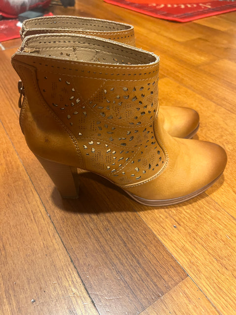 Perforated boots