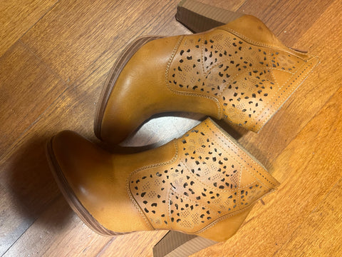 Perforated boots