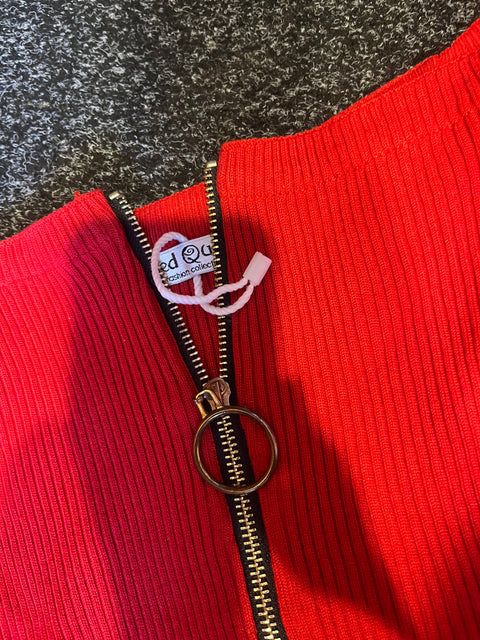 Red crop top with zip fastening